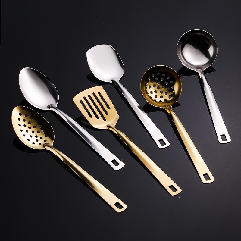 6-Piece Stainless Steel Cookware Set: Includes Wok, Spatula, Frying Pan, Ladle, Colander, Serving Spoon, and Strainer.