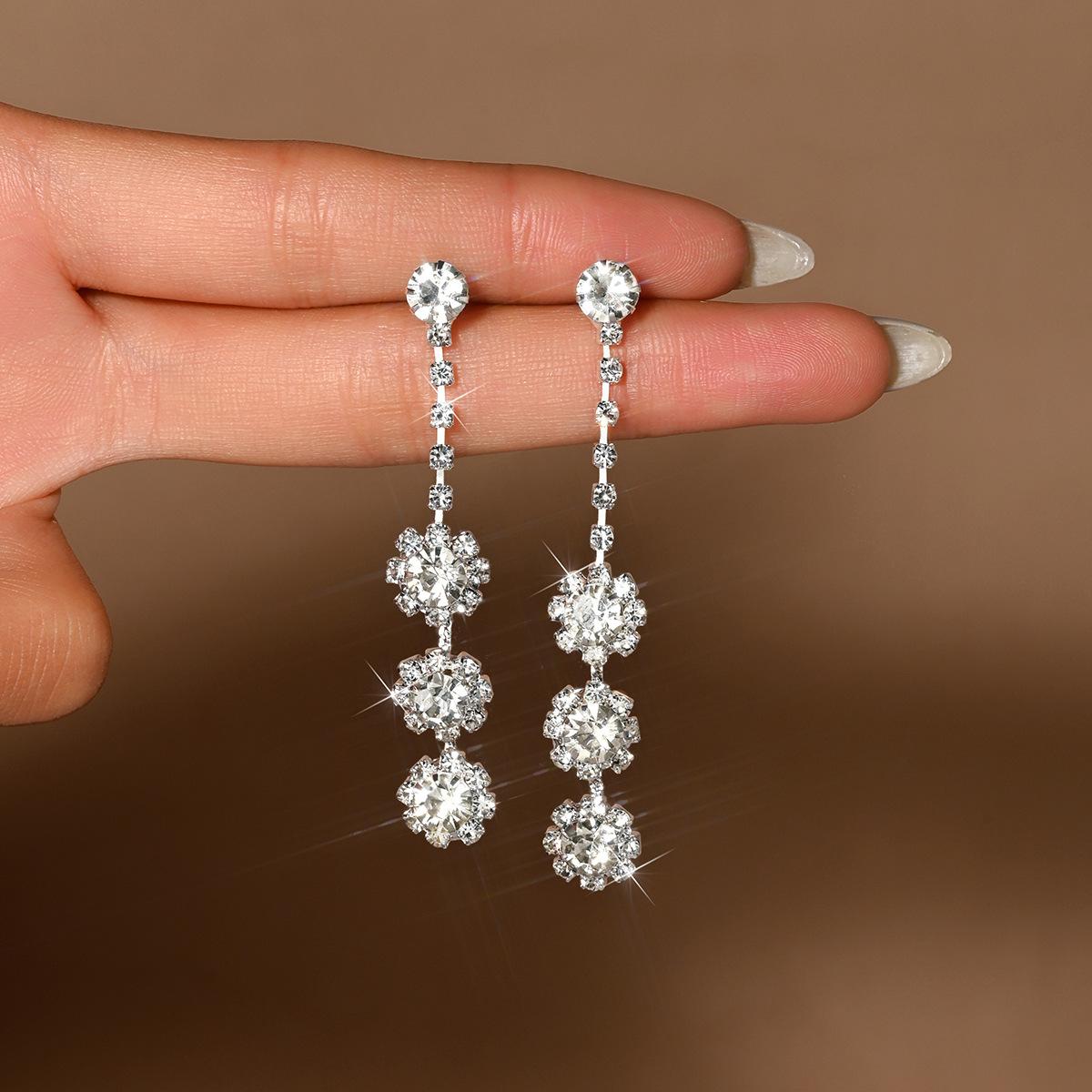 

Tide Full Diamond Tassel High Sense Light Luxury Style Personalized Design Sense Earrings Temperament Earrings