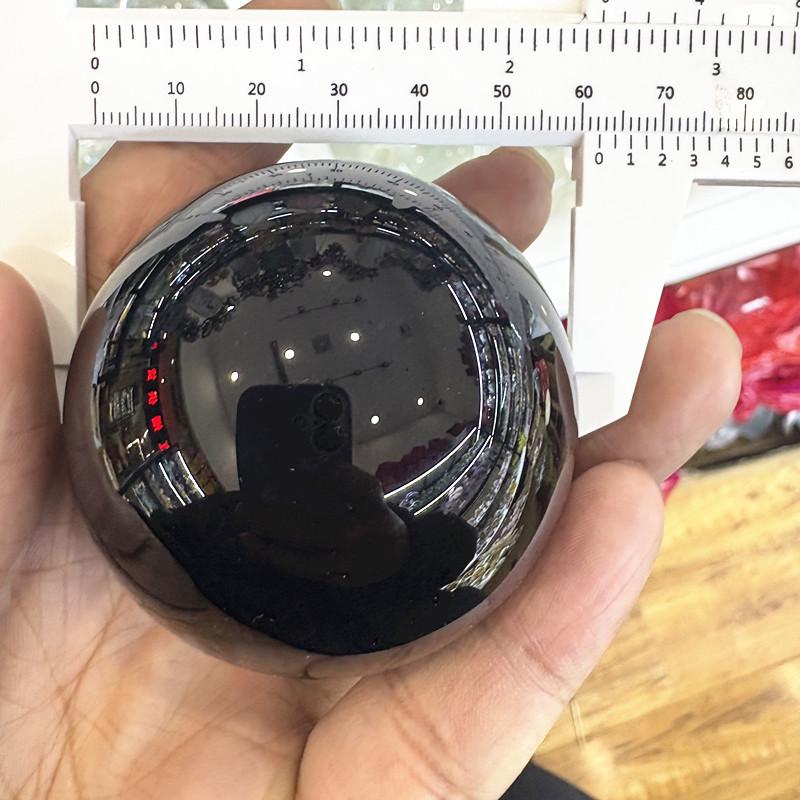Black Stone Round Glass Ball Sculpture with Inlaid Eyes - No-Hole Design for Display and Decoration