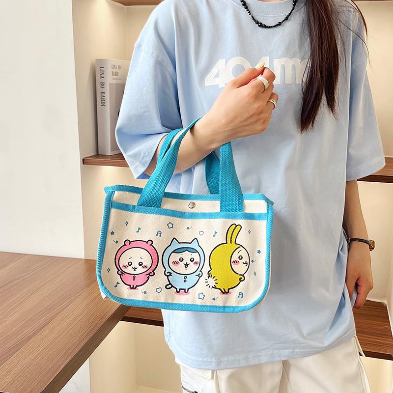 

Холщовая сумка женская 2025 высокая ценность мультяшная сумка для рук сумка для бенто для выхода в свет большая вместимость многофункциональная сумка-тоут синий