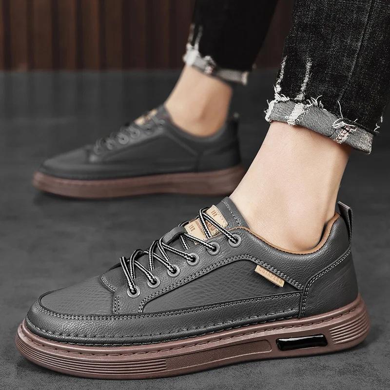 Chaussures de sport décontractées imperméables respirantes antidérapantes pour hommes Printemps Nouveau Style Baskets en toile blanche à enfiler Semelle en caoutchouc