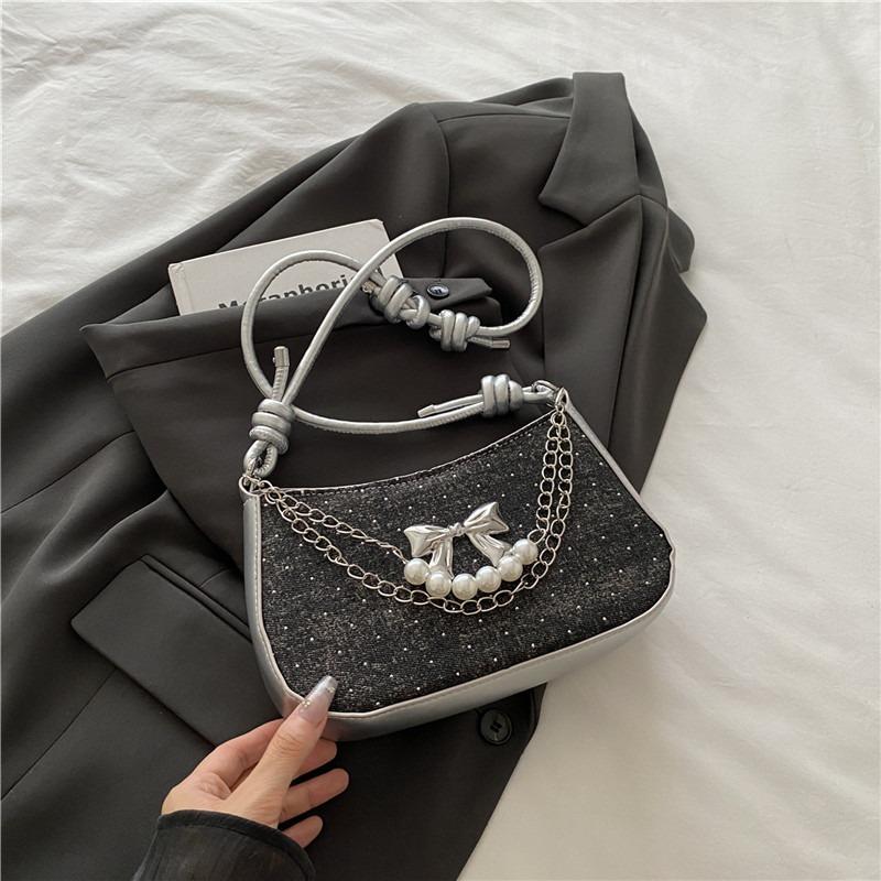 

Underarm bag female design sense niche summer new fashion now popular bow shoulder messenger bag