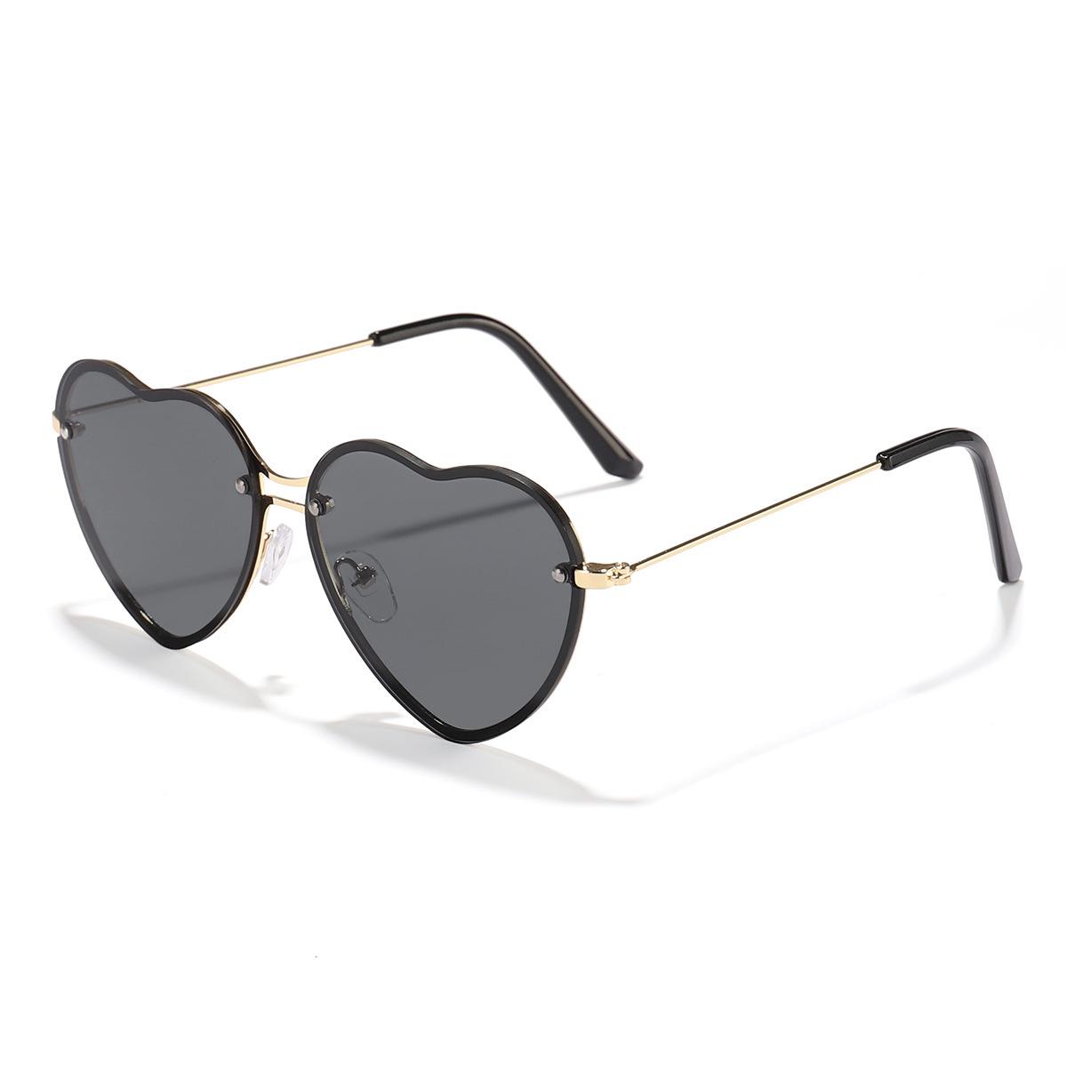 New Anti-ultraviolet Love Sunglasses Heart Shaped Sunglasses Metal Women Fashion Rimless Clear Ocean Lenses Sun Glasses UV400