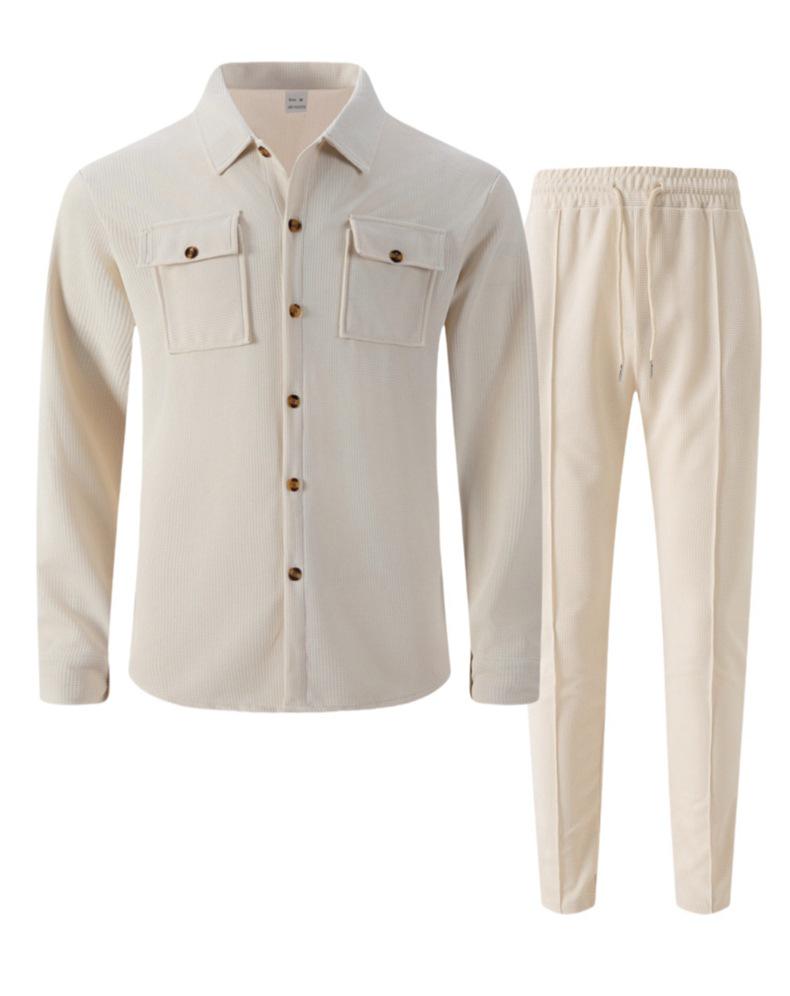 Completo casual da uomo autunnale europeo con giacca a maniche lunghe a nido d'ape e pantaloni