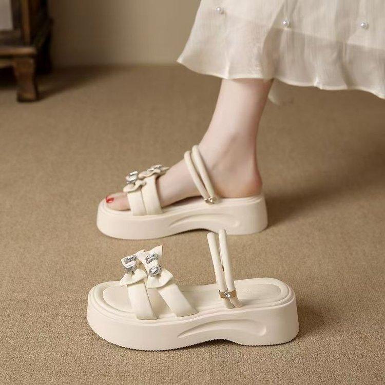 Premium sandals women's summer 2025 new muffin heel shoes fairy wind thick sole two wear sandals soft sole half drag