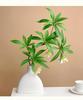 Lifelike Artificial Flower Arrangement - Potted Green Plants for Indoor Decoration in Living or Dining Rooms.