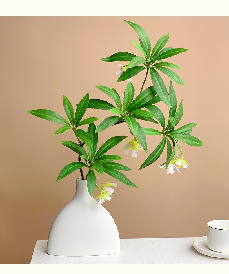 Lifelike Artificial Flower Arrangement - Potted Green Plants for Indoor Decoration in Living or Dining Rooms.