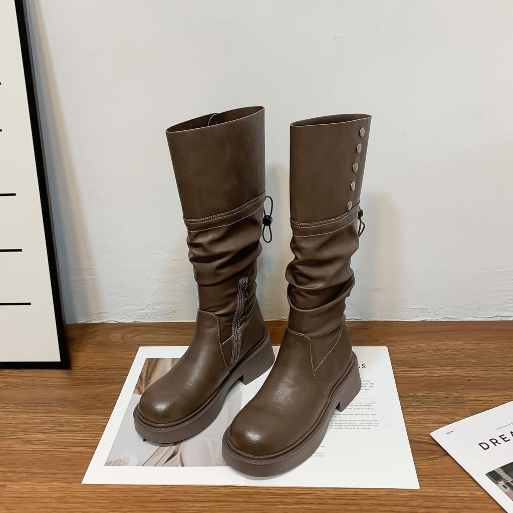 Winter new long knight boots women's wear high-end thick-soled women's boots long tube but knee-fold piled boots