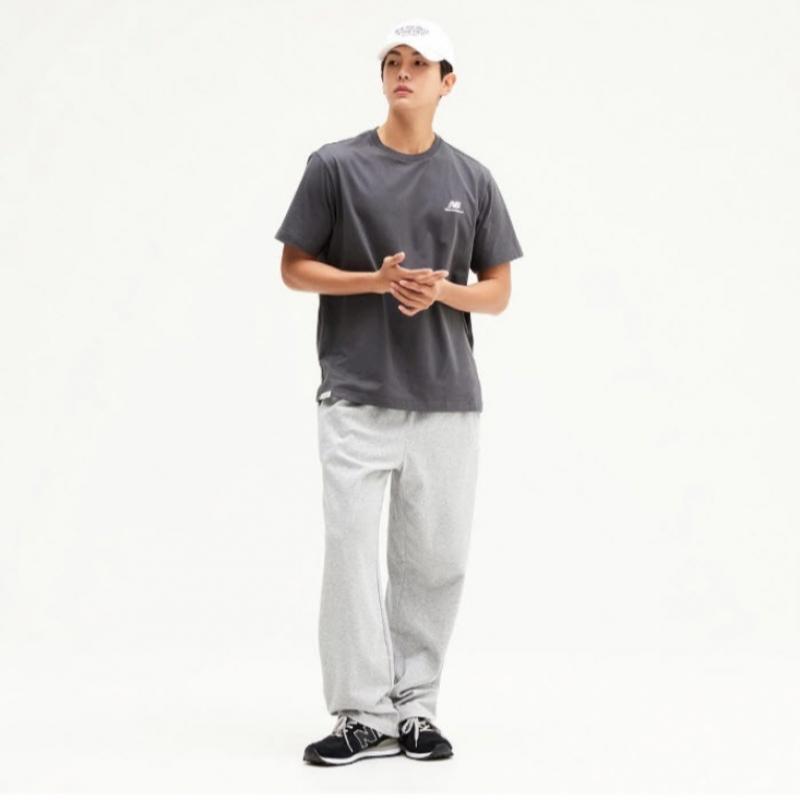 New Balance Tee Kqj Nbnee21013 17 Common Essential Small Logo Short Sleeve Tee Stan