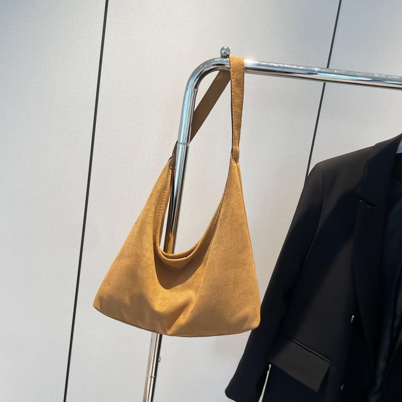 Large Capacity Niche Casual Commuter Tote Bag 2025 New Fashion Personalized Armpit Bag Retro Simple Shoulder Women's Bag