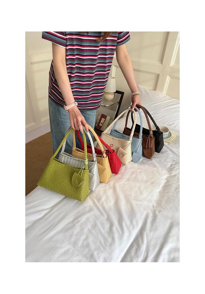 Elegant French Woven Pattern Baguette Women's Shoulder Bag 2026