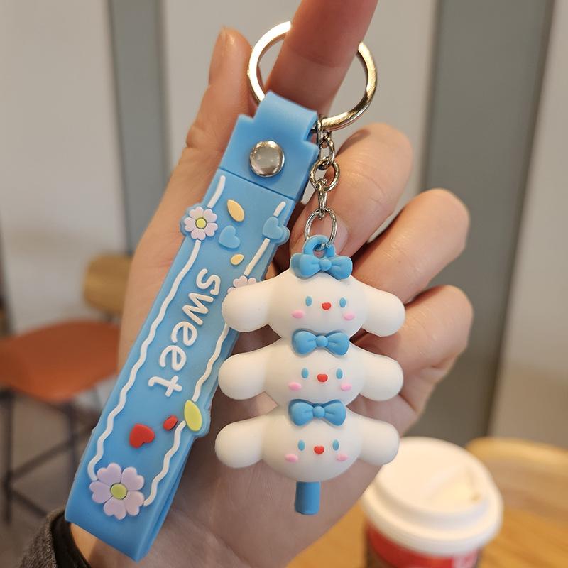 Yugui Dog Gestapelter Le Schlüsselanhänger Niedlicher Cartoon Melody Pudding Dog PVC Puppe Taschenanhänger