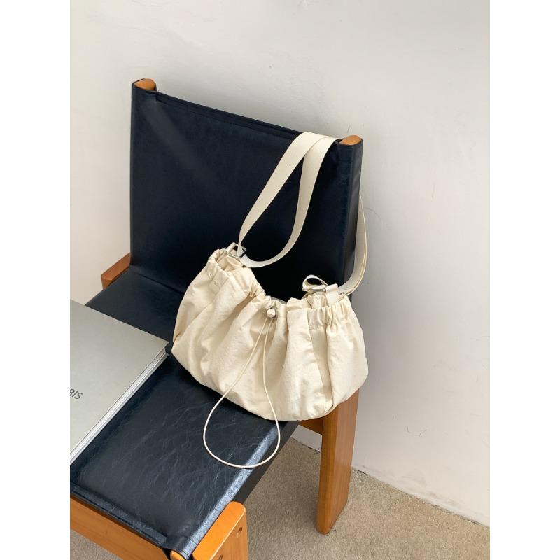 

Nylon pleated bag drawstring light and casual new shoulder bag bag niche design lazy messenger bag woman бежевий