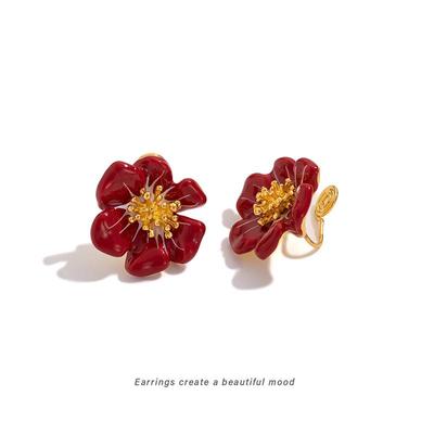 Retro Chinese-Style Plum Blossom Earrings: Exquisite Whitening Red Flower Ear Studs with Mosquito Coil Plate Clips for Autumn/Winter.