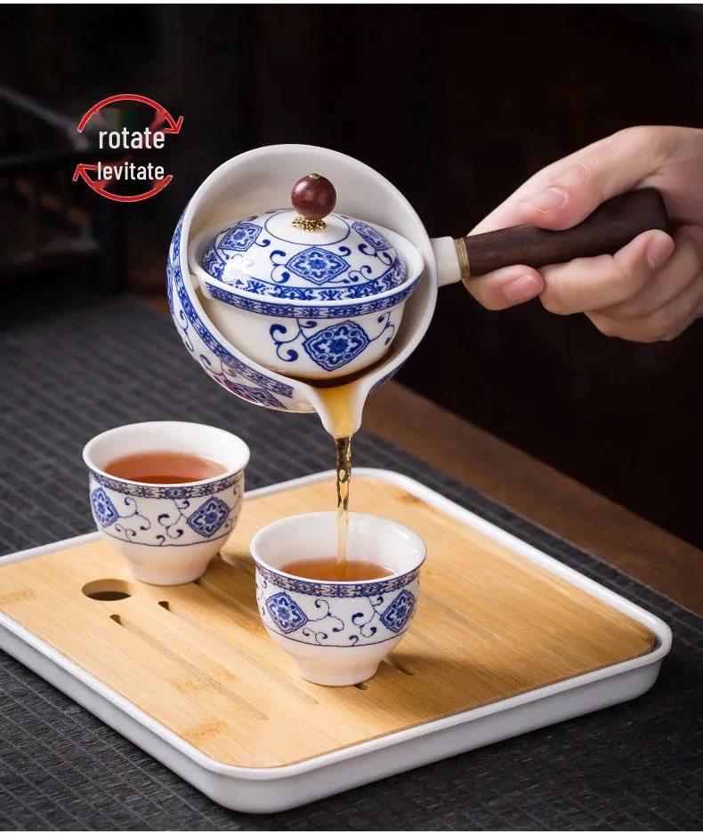 Compact Travel Tea Set with Automatic Rotating Teapot and Side Handle Kung Fu Cups