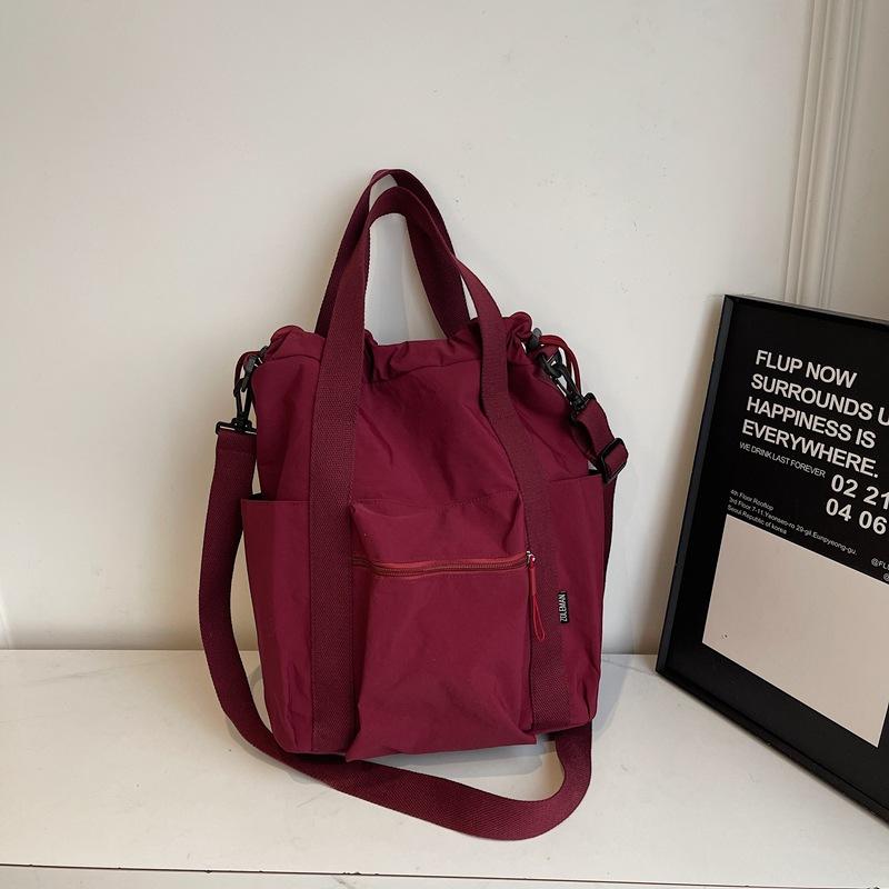 

Вместительная сумка-тоут для поездок на работу, женская, лето 2025, новая холщовая сумка через плечо, сумка-мессенджер, многофункциональный легкий рюкзак No specification красный