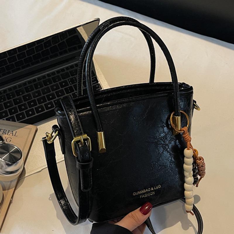 Casual retro small bag women's new fashion messenger bag commuter shoulder high value bucket bag
