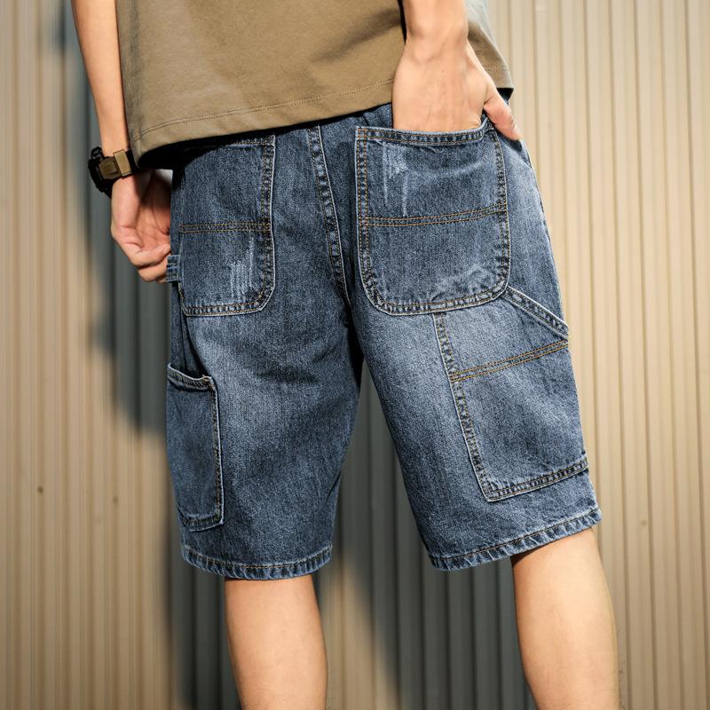 Pantaloncini di jeans da uomo, estivi sottili larghi dritti casual alla moda marca strappati cinque o sei divisione del lavoro pantaloni da uomo