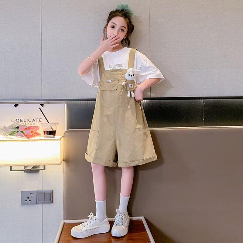 

Girls Fashionable Summer Sportswear Set - Stylish Short-Sleeve Top & Shorts Two-Piece for Big Girls 110 фіолетовий