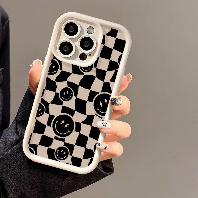 Anamorphic black smiley face for iPhone17 ProMax mobile phone case 16 Apple 17 matte 14/15 Premium 13