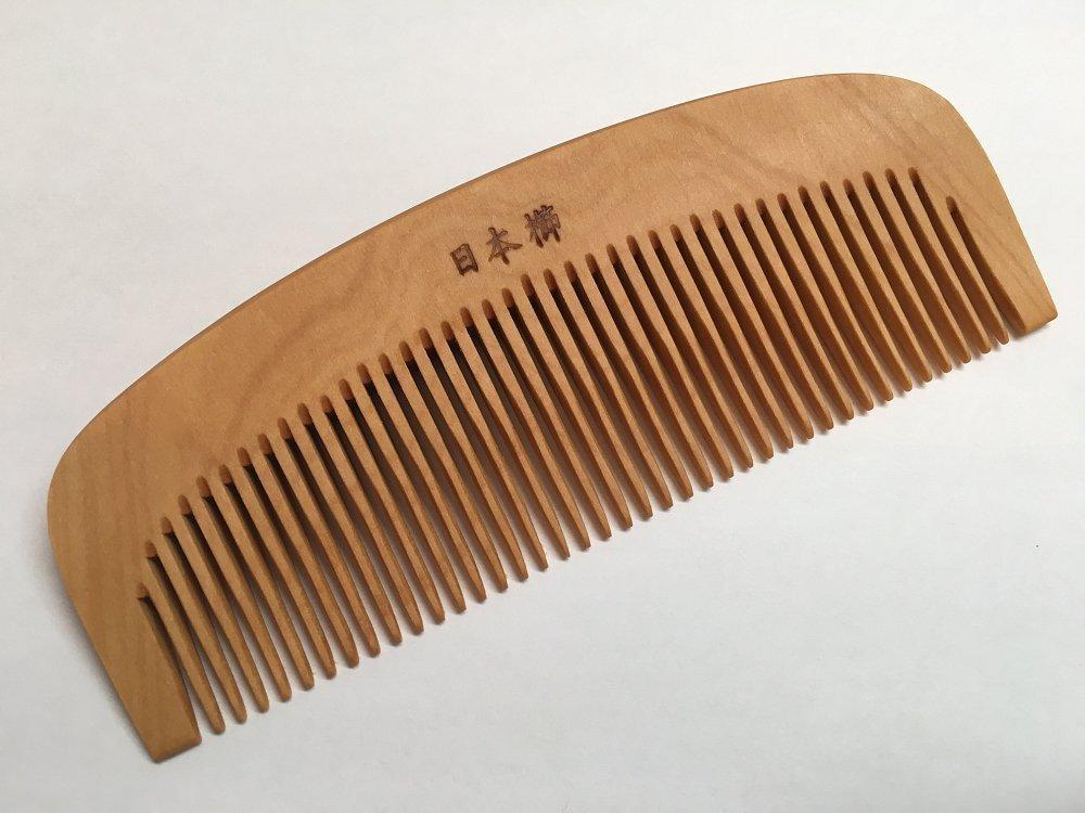 

Akane Boxwood Comb with Camellia Made in Japan (3.5 inches) Oil,