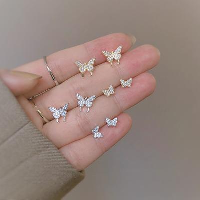 Brincos de borboleta super fada diamante cheio luz luxo pequenos brincos de borboleta ins brincos de vento frio