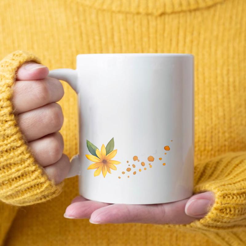 Ceramic coffee mug with white and yellow flowers for a cozy morning coffee break or coffee break белый