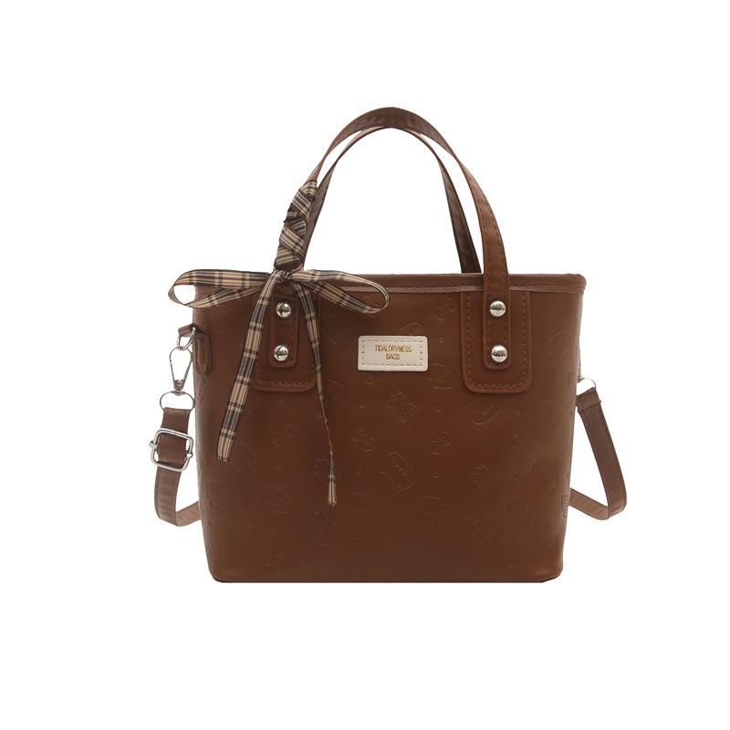 Retro simple new bucket bag fashion casual bag spring new texture women's shoulder messenger bag