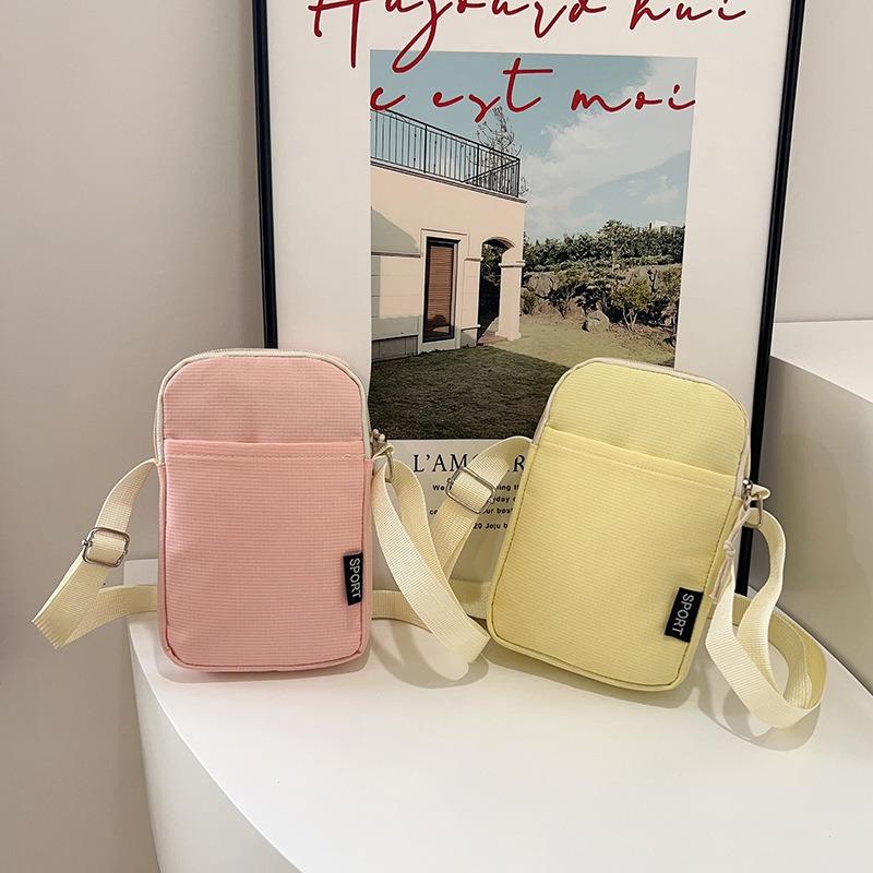 Multi-color mobile phone bag, large-capacity shoulder bag, simple and fashionable messenger bag, solid color change bag, nylon small backpack.
