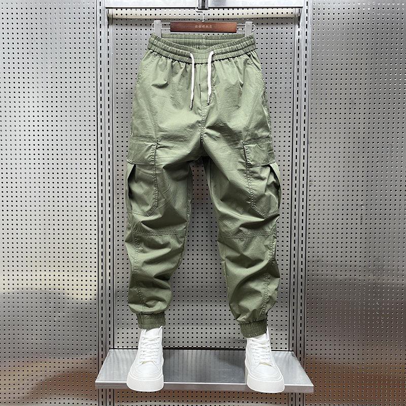 Men's Tapered Quick-Dry Elastic Cargo Pants with Drawstring, Multi-Pocket, Casual Trendy 9-Point Style for Spring and Autumn.