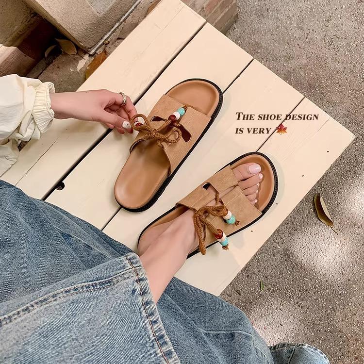 

Thick-bottomed cross-strap open-toed cool slippers for women to wear summer 2025 new versatile beach vacation one-word slippers 40