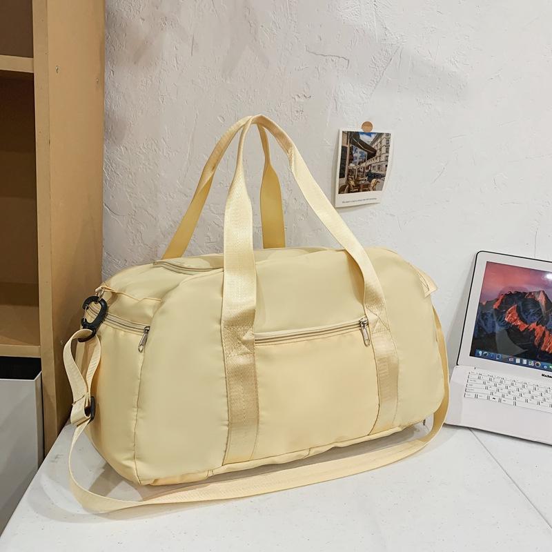 

Просторий багатофункціональний спортивно-туристичний рюкзак з відділенням для вологого/сухого та ременем для носіння як сумки-месенджера 20-35L жовтий