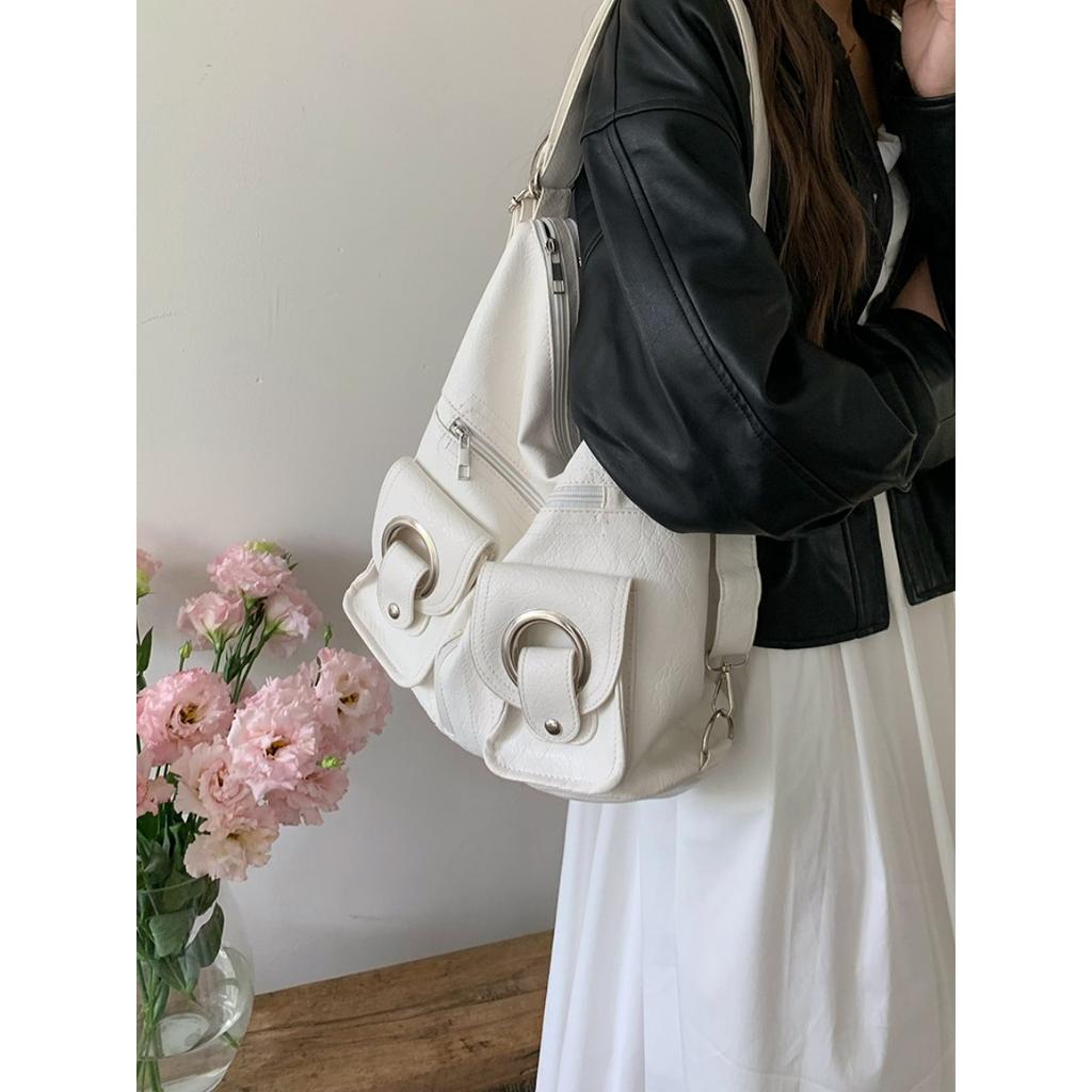 Koreanische Version Schlichte Persönlichkeit Vielseitig Modisch Reißverschlusstasche PU-Leder Tragetasche Schultertasche Pendeln Große Kapazität Rucksack