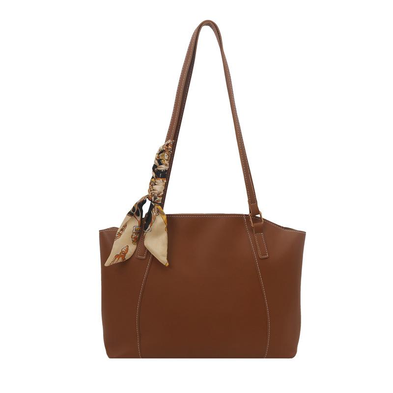 

Large-capacity bag women s spring and summer versatile 2025 new fashionable and simple shoulder bag texture commuter tote bag світло-коричневого кольору