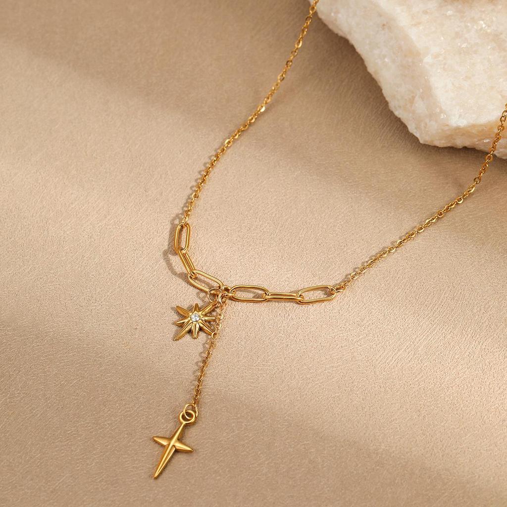 Hot-Selling Eight-Pointed Star Necklace: Gold-Plated Copper Tassel with Diamond-Studded Cross Pendant on Minimalist Clavicle Chain.