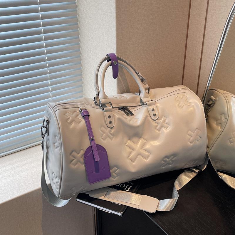 Fashionable PU Embossed Women's Handheld Travel Bag - Large Capacity Carry-on with Wet/Dry Separation for Business and Fitness.