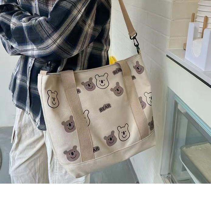 Large capacity versatile canvas shoulder bag bag female student make-up bag portable shopping bag cute AB bear bag