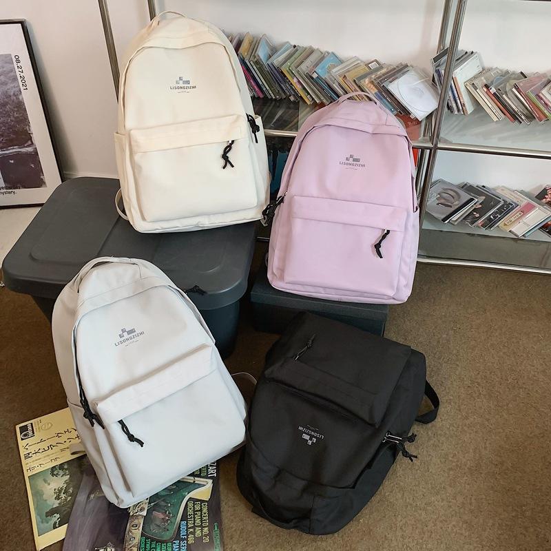 Schoolbag female new ins Japanese junior and high school students large-capacity backpack lightweight and simple college backpack