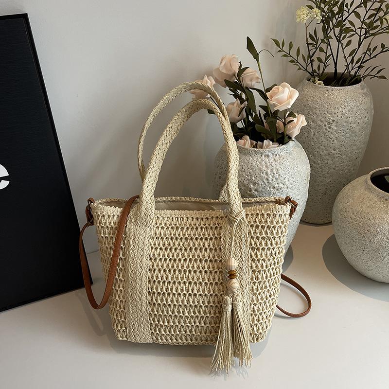 

Large capacity seaside vacation beach bag women s summer new casual hand-woven straw commuter tote bag белый