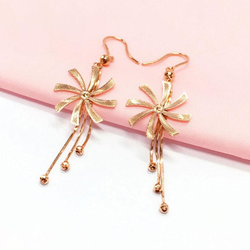 Фиолетово-золотые серьги-серьги с бахромой в виде змеиной кости, вращающиеся, блестящие, изысканные серьги с иностранным дизайном, покрытые розовым золотом