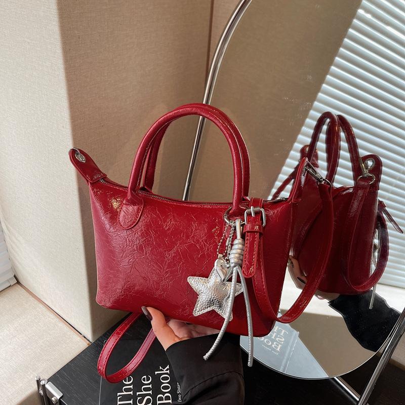 Premium texture portable dumpling bag women's new fashionable exquisite shoulder bag casual commuter messenger bag