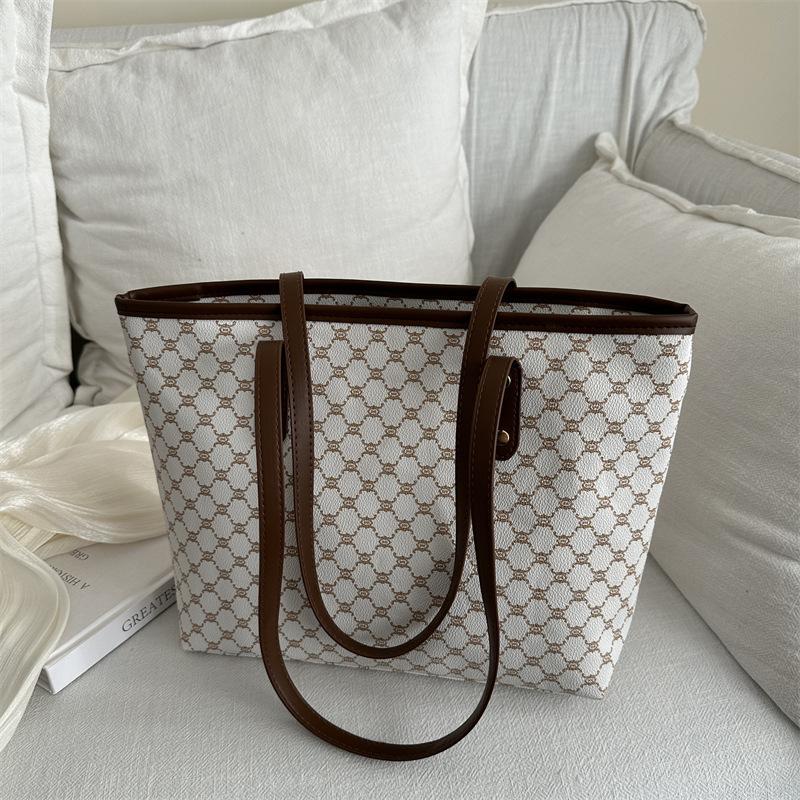Bag women's personality new trendy niche design simple hand shoulder bag large capacity tote bag