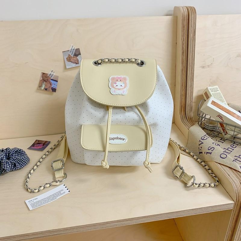 

High-value girls toilet bag, simple casual small backpack, cute bow floral college style flip backpack.