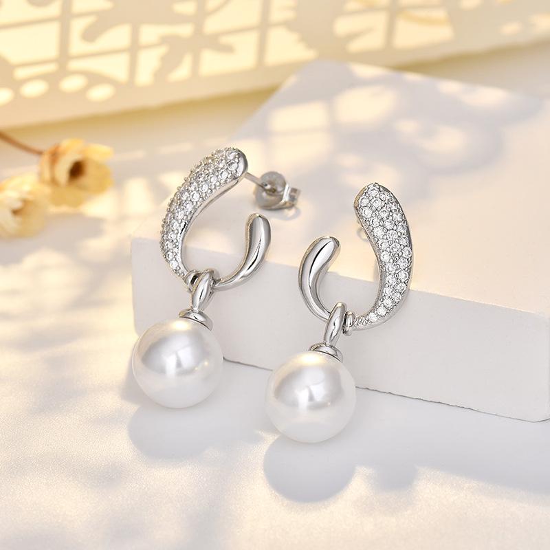 

Горячий стиль, изысканные серьги-гвоздики с имитацией жемчуга и циркония для женщин, модные, легкие, роскошные и элегантные серьги