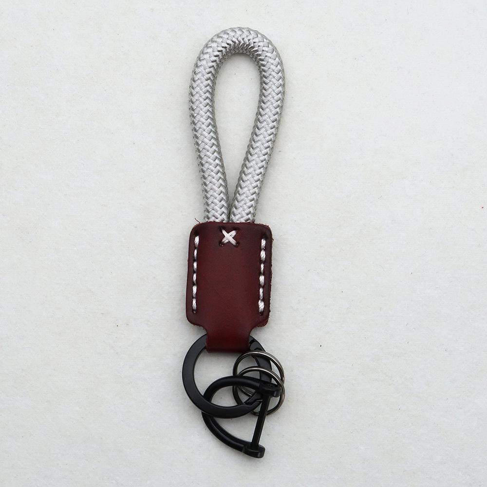 Hand-Woven Cowhide Leather Keychain Pendant with Logo Embossing - High-Quality Anti-Lost Car Lanyard