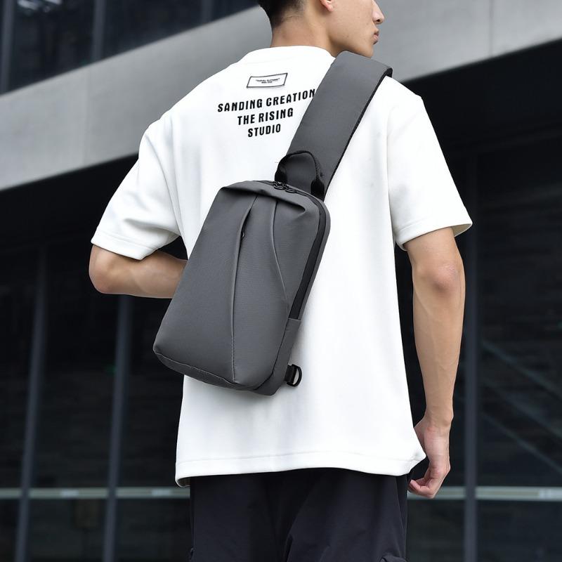 Large-capacity wear-resistant waterproof breast bag, new men's business parcel, multi-functional messenger bag.