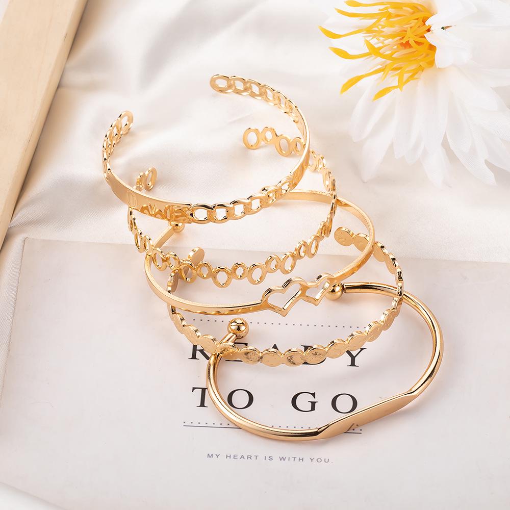 European & American 5-Piece LOVE Bracelet Set: Creative Hollow Bangles with Double Heart Design