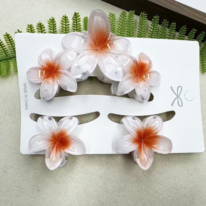 Sada skřipců do vlasů s frangipani: Květinové vlasové doplňky s imitací mramoru pro módní svátky