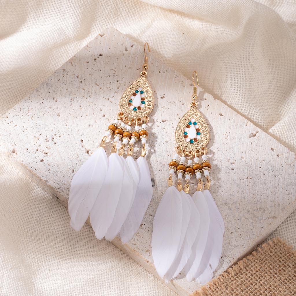 Retro ethnic style woven feathers long fringed earrings, bohemian high-end hollow rice bead earrings