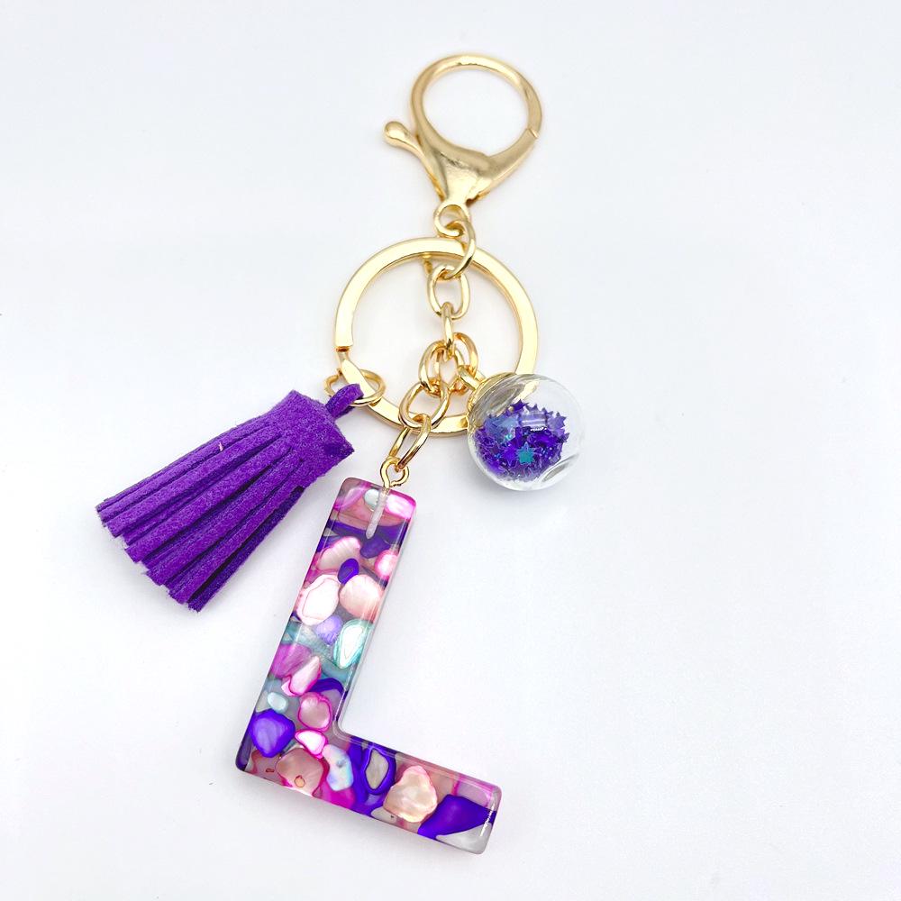 Breloc inițial englezesc de vânzare la cald european și american cu accesoriu cu ciucuri violet